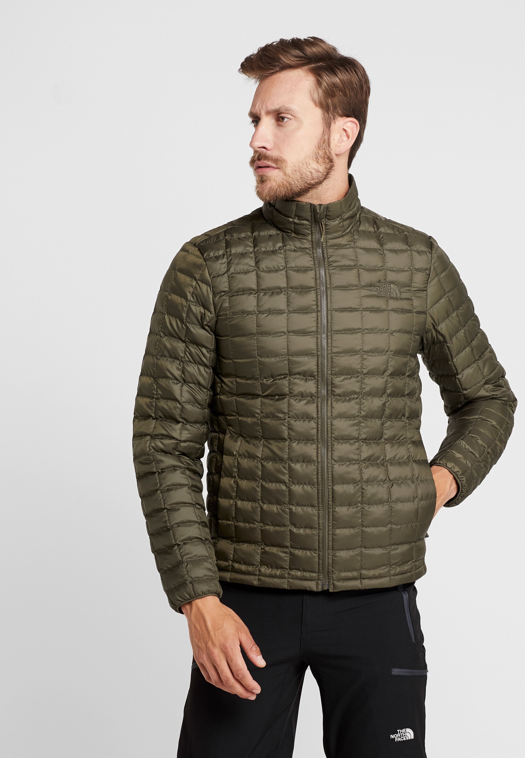 taupe green north face jacket