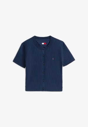 Lühikeste varrukatega tumesinine soonikkoes kardigan ümarate kaelusega, ees nööpidega ja väikese Tommy Jeans logoga rinnal.