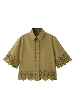 Olive green short-sleeve shirt with pointed collar, button front, and scalloped lace cutout detailing on sleeves and hem.