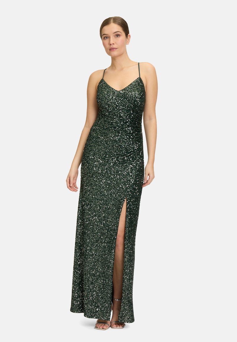 Grünes Pailletten-Abendkleid mit tiefem V-Ausschnitt, dünnen Trägern und einem hohen Schlitz bis zum Oberschenkel. Bodentiefe Ausführung mit figurbetontem Schnitt und schimmernder Textur.