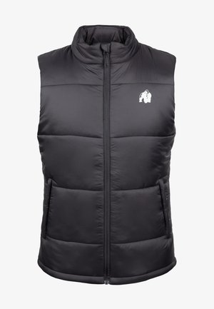 Zwarte puffer gilet met hoge kraag, vooraan met ritssluiting en zijzakken. Bevat een logo op de linkerkant van de borst en is voorzien van een gestikte textuur.