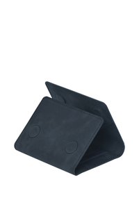 Navy leather wallet with a smooth texture, featuring a triangular shape and two circular magnets for secure closure and easy access.