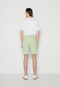 GANT REG SHIELD  - Pantalon de survêtement - milky matcha