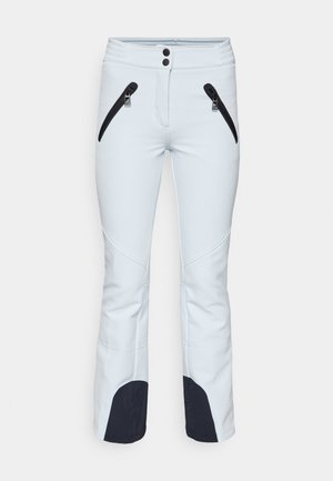 Jasnoniebieskie spodnie narciarskie wykonane z wytrzymałego materiału, wyposażone w dwie czarne kieszenie na zamek, wzmocnione czarne panele przy kostkach oraz zapięcie na guzik.