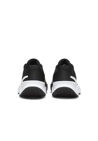 Scarpe sportive nere con una parte superiore in tessuto testurizzato, suola intermedia bianca e suola esterna in gomma con motivo. Presenta una linguetta sul tallone.