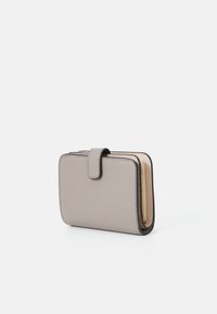 Compact gray wallet with a textured finish, a front snap closure, and a gold zipper along the side, featuring a beige interior.