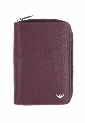 Portefeuille compact en cuir bordeaux avec texture visible, fermeture éclair argentée sur le dessus et le bord droit, et petit logo argenté en bas à droite.