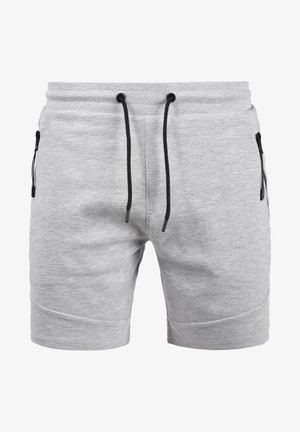Grå bomullsblandede shorts med elastisk midje, sort snor, og to sidelommer med glidelås. Har en glatt tekstur og kort lengde.