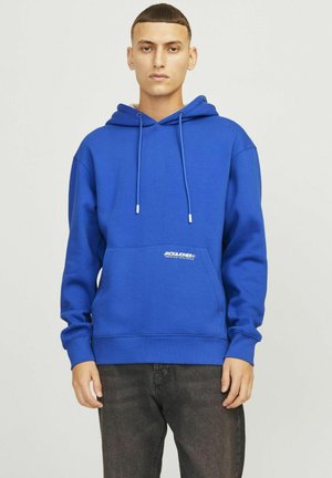 Blue hooded sweatshirt with drawstrings, pouch pocket, and white logo detail on the front. Made of soft material with a relaxed fit.