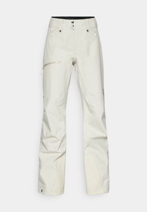 White ski pants with a water-resistant fabric, featuring zippered pockets and a textured accent at the ankle. Straight-leg design.