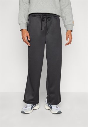 HUNTER - Tracksuit bottoms - jet black