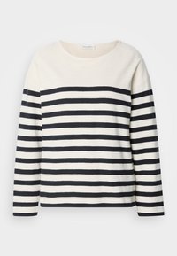 Μπλούζα με μακριά μανίκια σε κρεμ βάση και ναυτικές οριζόντιες ρίγες. Διαθέτει στρογγυλή λαιμόκοψη και άνετη εφαρμογή. Μαλακό υλικό από βαμβάκι.