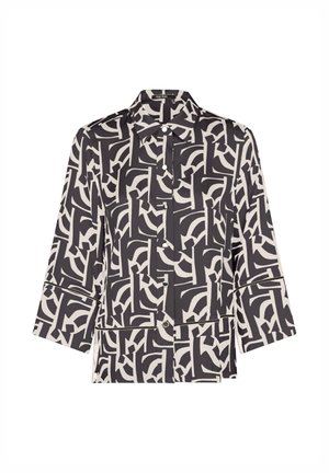 Black and white abstract patterned long-sleeve button-up shirt with wide cuffs and a classic collar.