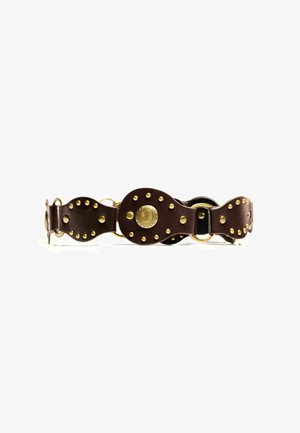 Brown leather belt with wavy design, featuring gold studs and a decorative circular buckle, secured by a gold ring.
