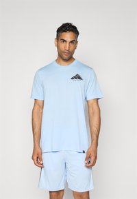 adidas Performance Sports T-shirts - glow blue