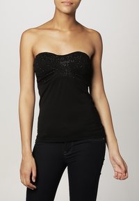 Haut noir bustier à coupe ajustée. Comprend un buste froncé orné de décorations scintillantes sur la poitrine. Texture douce.