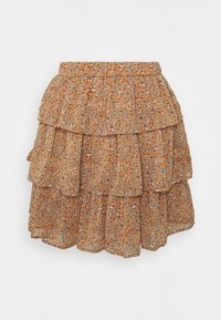 Mini-jupe beige à volants avec imprimé floral orange, blanc et marine et taille élastiquée froncée.