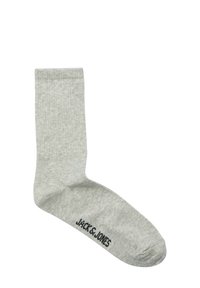 Grijze katoenen sok met geribbelde textuur, voorzien van een afgeronde teen en een zwart gedrukt logo aan de zijkant. Klassiek en veelzijdig design.