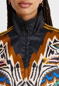 adidas Originals ADIDAS FARM RIO FIREBIRD TRACK - Treningsjakke - crystal sand