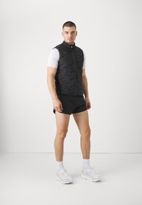 HOKA INSULATED RUN VEST - Vestă - black