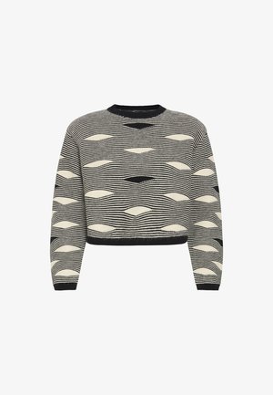 Maglione a maniche lunghe a righe bianche e nere con motivi astratti ovali traforati e scollo rotondo.
