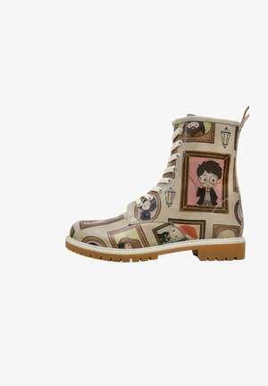 Lace-up ankle boot in beige synthetic material, featuring printed portraits in frames, rubber sole, and textured accents.