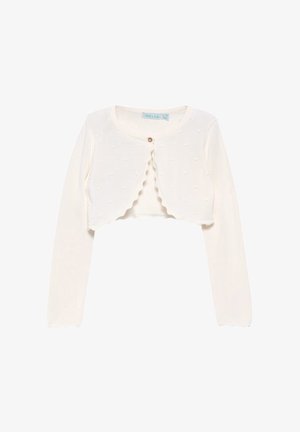 Cardigan bianco corto con maniche lunghe, texture a coste, bordi ondulati e piccoli dettagli a forma di cuore. Chiusura con un bottone centrale.