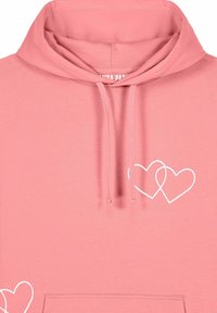 Gaiši rozā kapuce ar baltām izšūtām pārklājošu sirds dizainiem, ar auklu kapuci un lielu priekšējo kabatu. Mīksta kokvilnas maisījuma audums.