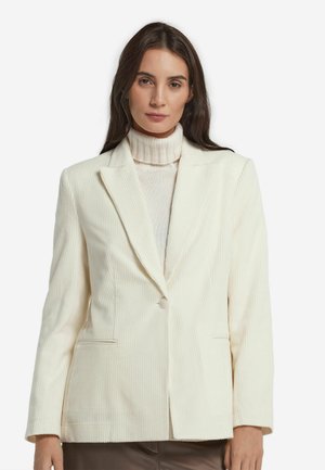 Crèmekleurige corduroy blazer met een notch lapel, enkele knoopsluiting, klepzakken en een gestructureerde silhouet. Gladde textuur, tijdloos ontwerp.
