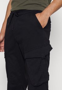 Redefined Rebel PANTS - Calças cargo - black