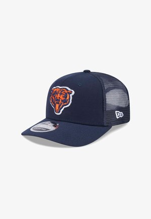 Navy blue mesh baseball cap with orange roaring bear logo on front and white brand emblem on side, curved brim, and adjustable back.
