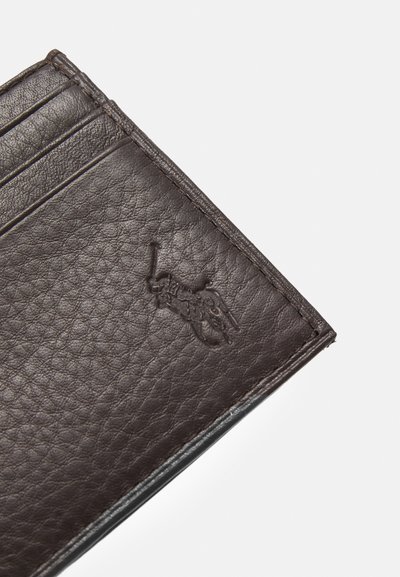 Brown leather wallet featuring a textured surface, multiple card slots, and a debossed logo detail on one side.