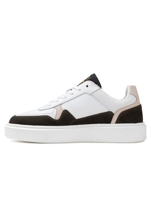 White sneaker with brown suede accents and beige detailing. Features a textured sole, round toe, and flat laces. Minimalist design.