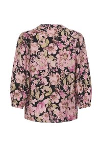 Blouse fleurie avec des fleurs roses, beiges et vertes sur fond noir, avec des manches longues bouffantes et une coupe ample.