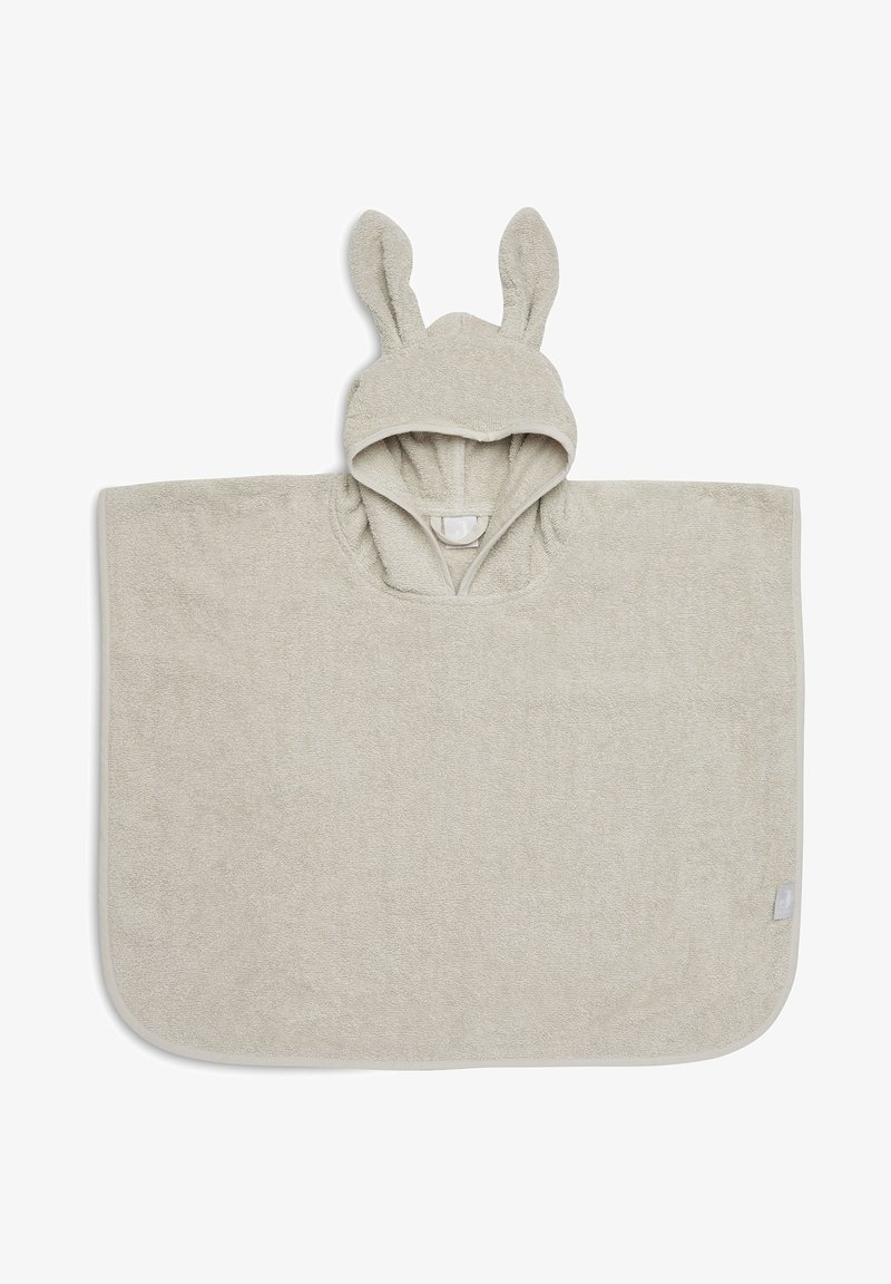 Poncho en serviette doux en beige, avec une capuche ornée d'oreilles de lapin et des coins arrondis, conçu pour le confort et la chaleur.