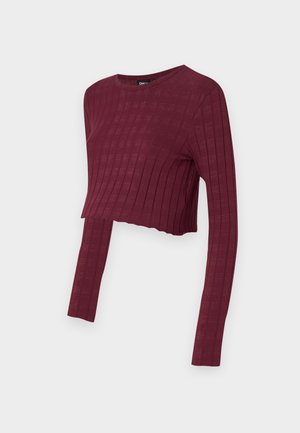 Burgundinės trumpintos ilgomis rankovėmis palaidinė su raukšlėta tekstūra. Apvali kaklo iškirptė ir prigludęs stilius, išskirtinė ilgos rankovės. Minkšta, tampri medžiaga.