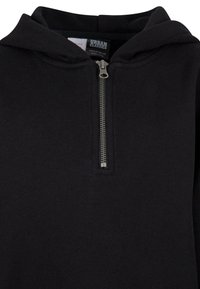 Svart zip-up huvtröja med en metallblixtlås, en huva och ett mjukt, texturerat tyg. Designen är enkel utan yttre mönster eller accenter.