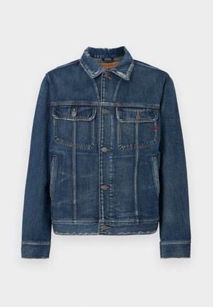 Tumesinises teksajakk, millel on klassikaline disain. Omab kahte rinna taskut, nööbikäimist ja peent pleekimist. Traditsiooniline krae ja mansetid.