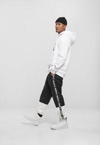 Starter Black Label STARTER  - Jogginghose - black/white