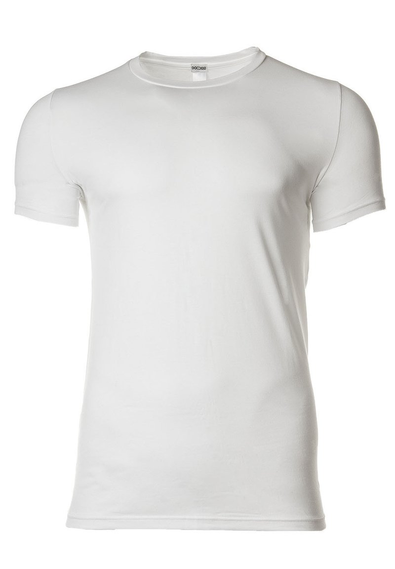 Hvid kortærmet t-shirt lavet af blød bomuld. Rund halsudskæring med sømløs syning og en tætsiddende silhuet.