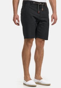 Black fabric shorts with a straight cut, front pockets, and a braided drawstring with leather accents. Flat hem and casual fit.