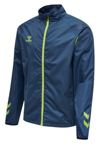 Granatowa sportowa kurtka z limonkowym zamkiem błyskawicznym, akcentami w kształcie jodełki na rękawach, kropkowanym wzorem na ramionach i stójką.