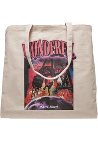 Beige Canvas-Shopper mit einem bunten Grafikdruck. Verfügt über fetten pinken Text "WUNDERBAR" und ein kreisförmiges Design am Boden.
