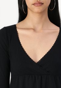 Hollister Co. Easy Long-Sleeve Pointelle Babydoll Top - Bluză cu mânecă lungă - casual black