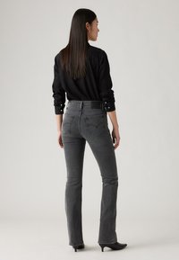 Levi's® 725™ HIGH RISE BOOTCUT - Bootcut jeans - into the fog
