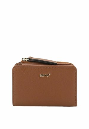 Compact brown leather wallet with gold logo, zipper closure, and a small flap on top against a white background.