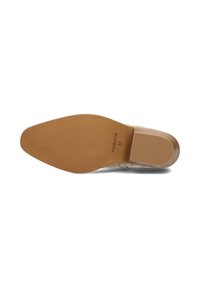 Sole della scarpa con tacco trasparente in gomma marrone chiaro, dotata di una superficie testurizzata e design appuntito. Timbro con "HABOOB 37."