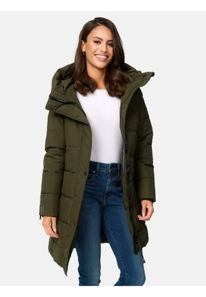 Long olive green puffer coat with a hood, featuring a zip front, quilted texture, and side pockets, worn over a white top and blue jeans.