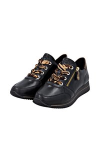 Black leather sneakers with brown and gold patterned laces, side zipper, and a rubber sole. Gold accents and soft texture detail.
