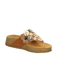 Tan slide sandal featuring a cork platform and decorative circular accents in various shades. Smooth leather upper with a textured outsole.